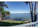 Expansive lake view from this home featuring a private dock and lush landscaping at 368 Northwest Dr, Davidson, NC 28036