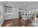 Spacious open-concept kitchen with modern appliances, island seating, and seamless flow to living spaces at 4056 Zilker Park Dr, Charlotte, NC 28217