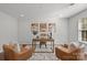 Serene home office featuring neutral tones, comfortable seating, and a well-lit workspace at 4056 Zilker Park Dr, Charlotte, NC 28217