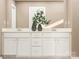 Elegant bathroom featuring a double vanity with white cabinetry, sleek hardware, and a clean, modern design at 4116 Skyboat Cir, Fort Mill, SC 29715