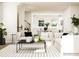 Bright and airy living room with an open layout leading to the kitchen and a staircase at 4124 Skyboat Cir, Fort Mill, SC 29715