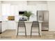Modern kitchen featuring white cabinets, stainless steel appliances, and island with barstool seating at 4136 Skyboat Cir, Fort Mill, SC 29715