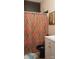 Bathroom with a patterned shower curtain, modern fixtures, and stylish décor at 426 Summer Ridge Rd, Stanley, NC 28164