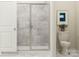 Modern bathroom features a glass-enclosed shower and a white toilet at 4551 Potters Wheel Dr, Fort Mill, SC 29715
