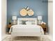 Stylishly decorated bedroom with decorative wall hangings and ambient lighting at 4563 Potters Wheel Dr, Fort Mill, SC 29715