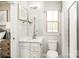 Bright, modern bathroom with a single vanity, sleek fixtures, and a glass-enclosed shower, offering a clean and stylish design at 517 Durango Way, Denver, NC 28037