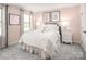 Cozy bedroom featuring soft pastel walls, comfortable bedding, and charming decor creating a serene atmosphere at 517 Durango Way, Denver, NC 28037