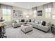 Inviting living room with large sectional sofa, complemented by natural light and stylish decor for relaxed gatherings at 517 Durango Way, Denver, NC 28037