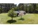 Well-maintained lawn and trees surround this charming single-story home at 5381 Mount Carmel Rd, Heath Springs, SC 29058
