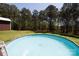Above ground swimming pool with lush green surrounding trees at 5381 Mount Carmel Rd, Heath Springs, SC 29058