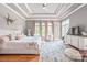 Bright main bedroom with trey ceilings, a ceiling fan, hardwood floors, a rug, and lots of natural light at 542 Lochaven Rd, Waxhaw, NC 28173