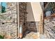 Inviting outdoor shower with stone accents, creating a spa-like experience amidst nature at 542 Lochaven Rd, Waxhaw, NC 28173