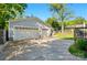 Spacious three-car garage with a large concrete driveway and well-maintained exterior at 576 Scaleybark Rd, Charlotte, NC 28209