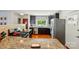Stylish kitchen with granite countertops, stainless steel appliances, and an eat-in area at 576 Scaleybark Rd, Charlotte, NC 28209
