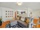 Open living space with hardwood floors that flows into the kitchen at 576 Scaleybark Rd, Charlotte, NC 28209