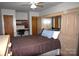 Comfortable bedroom featuring built-in closets, a desk, and neutral tones at 5769 Birch St, Conover, NC 28613