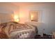 Cozy bedroom featuring a comfortable bed, dresser, and neutral decor at 5769 Birch St, Conover, NC 28613