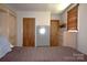Bedroom with a large bed, neutral walls and carpeted floors at 5769 Birch St, Conover, NC 28613