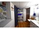 Practical laundry area with a washer, dryer, storage shelves, and access to another room at 5769 Birch St, Conover, NC 28613
