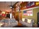 Bright and open living room with high ceilings, and exposed beams for a rustic feel at 5769 Birch St, Conover, NC 28613