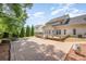 Beautiful backyard with a brick patio and plenty of space for outdoor enjoyment at 618 Circle Trace Rd, Monroe, NC 28110