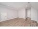 Large basement area features recessed lighting and two white doors at 618 Circle Trace Rd, Monroe, NC 28110