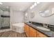 Primary bathroom features a glass shower, soaking tub, and double vanity with granite counters at 618 Circle Trace Rd, Monroe, NC 28110
