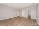 Large bedroom has hardwood floors, neutral paint, and recessed lighting at 618 Circle Trace Rd, Monroe, NC 28110