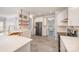 Modern kitchen featuring white cabinets, stainless steel appliances, a center island, and stylish backsplash at 618 Circle Trace Rd, Monroe, NC 28110