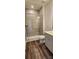 Modern bathroom with glass shower, sleek toilet and gray vanity at 642 Amberjack Pl # 75, York, SC 29745