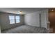 Cozy bedroom featuring carpet and natural light from double windows at 642 Amberjack Pl # 75, York, SC 29745