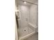 Modern shower with glass door, white marble tiles, and a built-in bench at 642 Amberjack Pl # 75, York, SC 29745