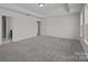 Spacious bedroom with neutral walls, carpet, recessed lighting, and tray ceiling at 642 Amberjack Ln, York, SC 29745