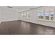 Bright living space with hardwood floors and large windows offering a view of the outdoors at 642 Amberjack Ln, York, SC 29745