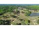 Picturesque aerial view of the golf course and country club with a pond at 680 Lakeside Dr, Rock Hill, SC 29730