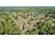 A sprawling golf course featuring lush greens, mature trees, and a scenic pond at 680 Lakeside Dr, Rock Hill, SC 29730