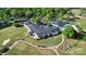 Beautiful aerial view of the golf course and country club featuring lush greens at 680 Lakeside Dr, Rock Hill, SC 29730