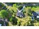 Aerial view of a home featuring mature trees, long driveway, and a backyard pool at 680 Lakeside Dr, Rock Hill, SC 29730