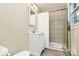Bathroom featuring a walk-in shower, modern vanity, mirror and neutral wall color at 680 Lakeside Dr, Rock Hill, SC 29730