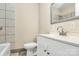 Bathroom featuring updated vanity, modern faucet and white tile at 680 Lakeside Dr, Rock Hill, SC 29730