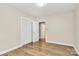 Bright bedroom with hardwood floors, closet, and neutral paint for a calming atmosphere at 680 Lakeside Dr, Rock Hill, SC 29730