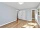 Bright bedroom with hardwood floors, closet, and neutral paint for a calming atmosphere at 680 Lakeside Dr, Rock Hill, SC 29730