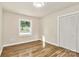 Neutral bedroom with hardwood floors and a bright window view at 680 Lakeside Dr, Rock Hill, SC 29730