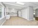 Spacious kitchen featuring white appliances, ample counter space, and tile floors at 680 Lakeside Dr, Rock Hill, SC 29730