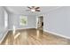 Sunlit living room featuring hardwood floors and a ceiling fan at 680 Lakeside Dr, Rock Hill, SC 29730
