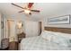 Inviting bedroom with a ceiling fan, bedside table, and ample closet space at 765 Southwest Dr, Davidson, NC 28036