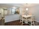 Cozy dining area featuring a stylish table set and warm, inviting decor at 765 Southwest Dr, Davidson, NC 28036