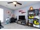 Bedroom featuring neutral paint, a ceiling fan, and a large television for entertainment at 7820 Elm Tree Ln, Charlotte, NC 28227