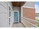 Cozy balcony with a partial lake view, offering a private outdoor space to enjoy the surroundings at 7822 Village Harbor Dr, Cornelius, NC 28031