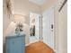 Charming entryway with hardwood floors, leading to a bedroom; offering a welcoming ambiance at 7822 Village Harbor Dr, Cornelius, NC 28031